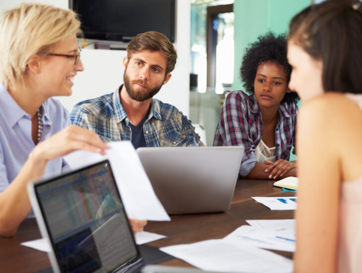 Female Manager Leading Meeting In Office